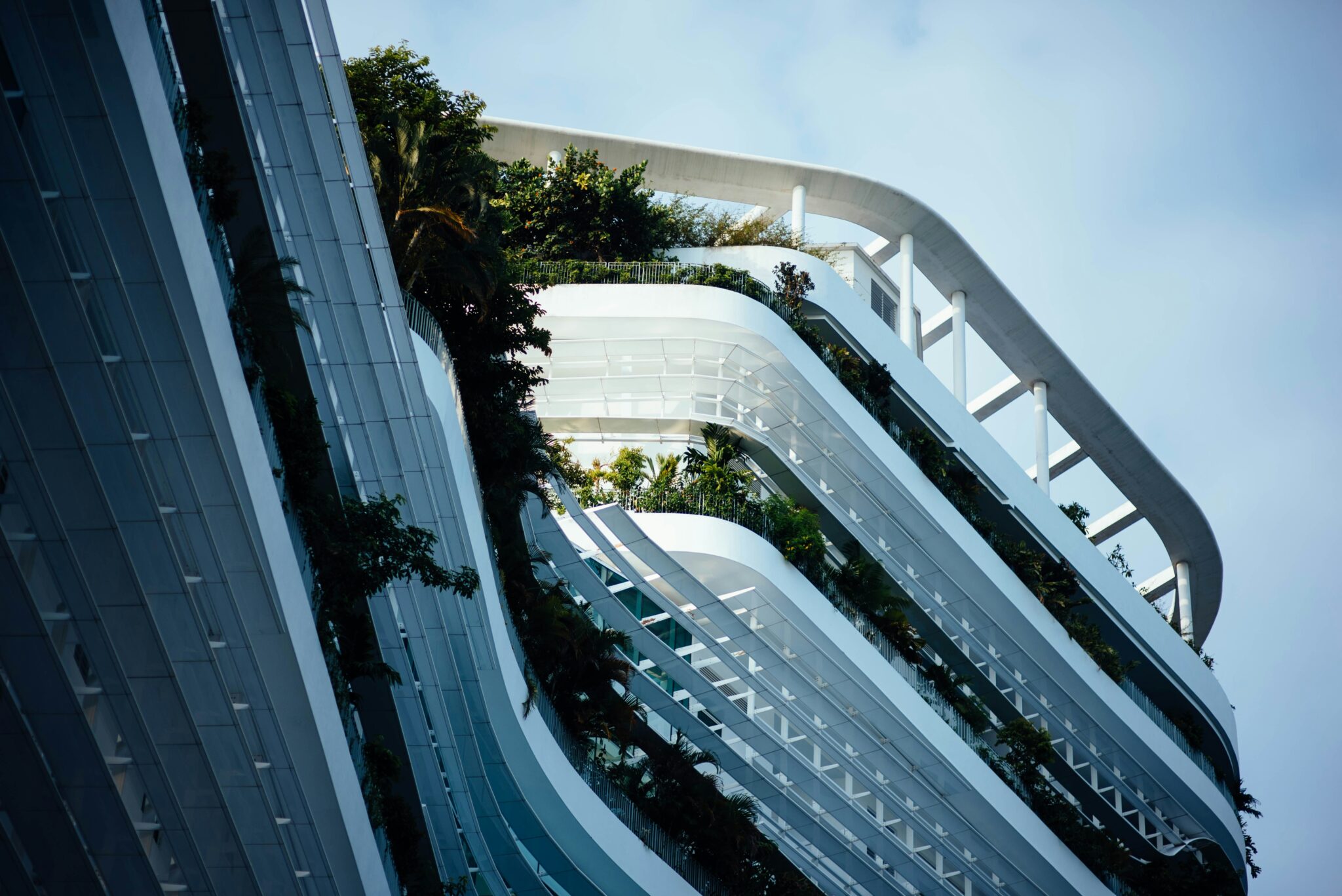 Curved modern building with planted terraces